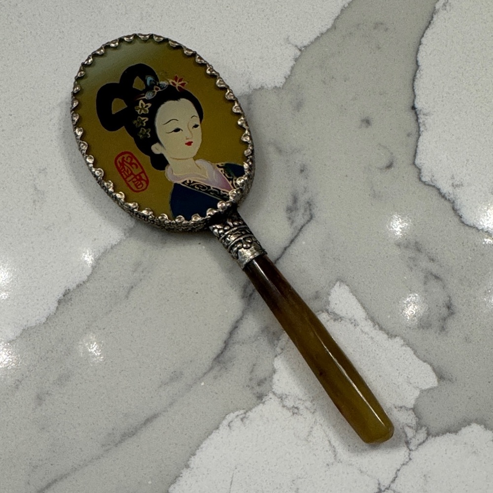 Vintage Japanese Handheld Mirror with Ornate Silver Frame